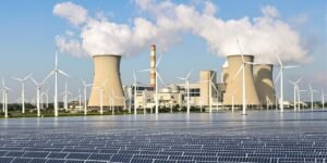 Power station, wind turbines, solar panels.