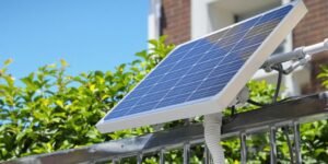 Compact solar panel on a sunny balcony.